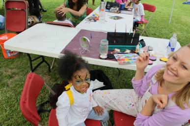 Ginger routh Face Painting at an event