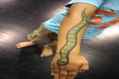 Green snake arm painting